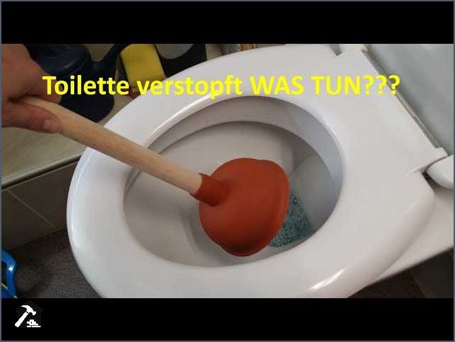 Toilette verstopft Verwenden Sie eine Spirale um das Problem zu lösen